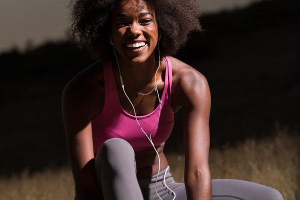 black woman runner tightening shoe lace